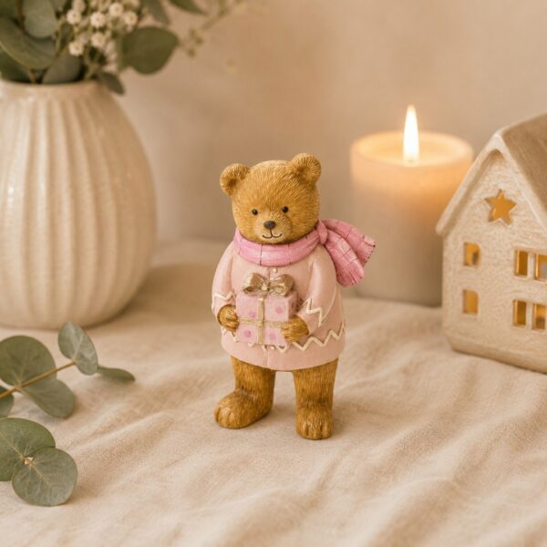 Orso in piedi con pacco rosa
